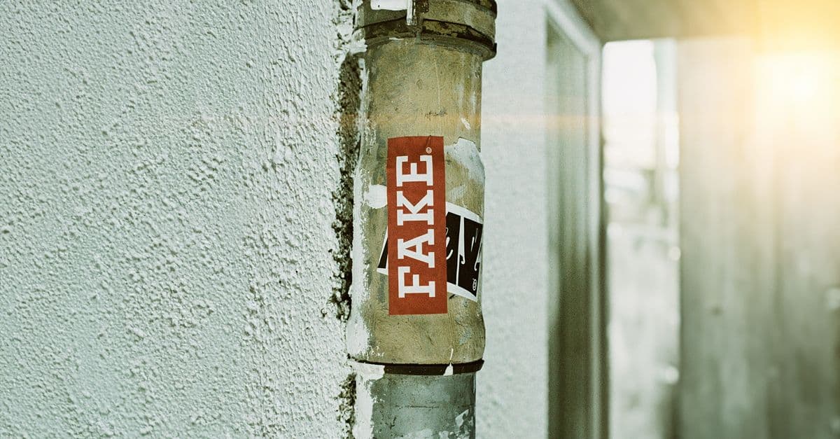 A pipe with a sticker saying: "Fake!"